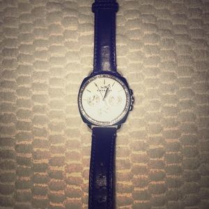 Coach watch with purple leather band
